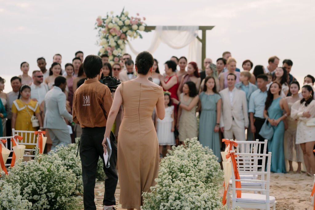 MC Phu Quoc instruction at a beach wedding